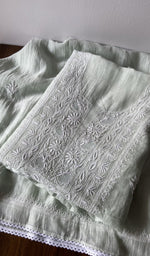 Folded kurta piece and dupatta, chikankari along the hem