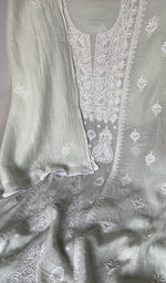 Sleeve work on green pure mul chanderi