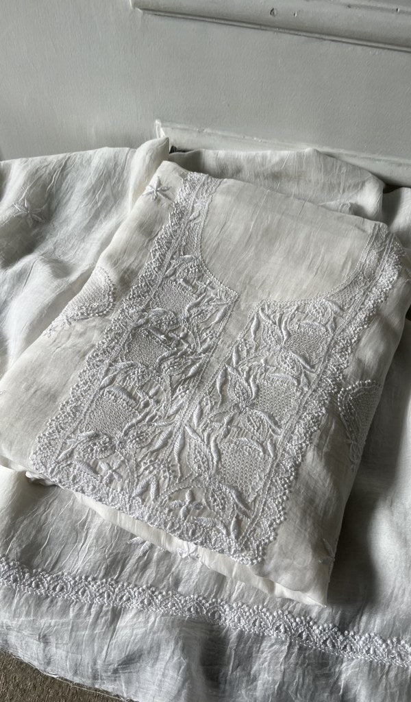 off white pure mul chanderi kurta piece folded, fine do taar and teen taar chikankari with haath ki jaali