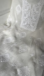 Hand jaali worked open across the panel