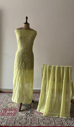 Yellow pure mul chanderi chikankari suit set on the mannequin with its dupatta