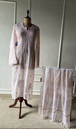 The set on the mannequin with its dupatta beside it