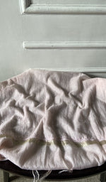 Bottom fabric draped over the stool
