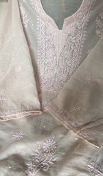 fine chikankari with beads cutdana and sequins across the body of the kurta
