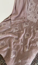 Kurta laid flat with the dupatta, do taar and teen taar chikankari with haath ki jaali