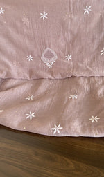The dupatta spread out, mauve mul chanderi