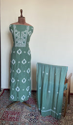 The set on the mannequin with its dupatta beside it