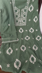 Kurta laid flat with the dupatta, do taar and teen taar chikankari with haath ki jaali