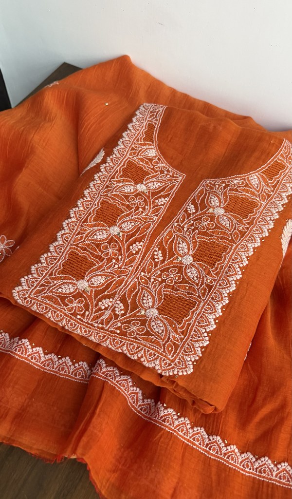 Orange mul chanderi kurta piece folded, gala work in front