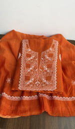 Second folded view of the orange kurta piece