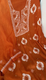 Do taar and teen taar chikankari with haath ki jaali on the orange kurta