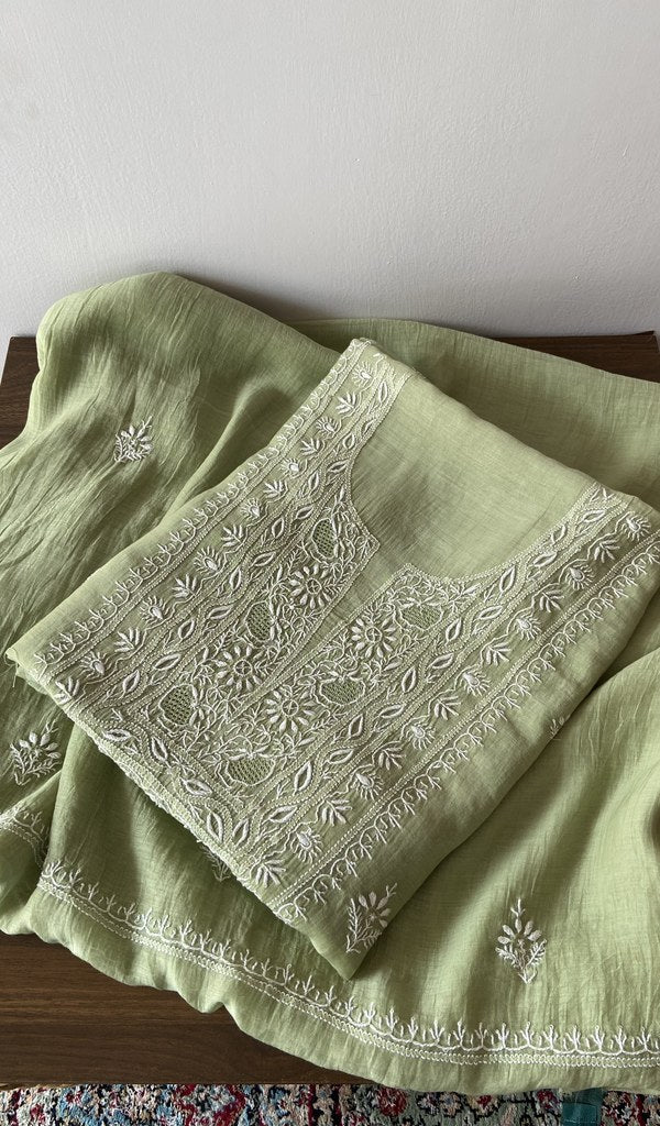 Green pure mul chanderi kurta piece folded, fine chikankari with haath ki jaali
