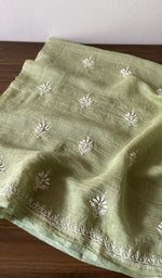 The kurta piece folded on the carpet