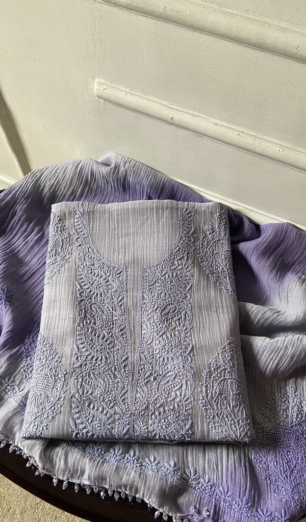 Purple pure mul chanderi kurta piece folded, fine chikankari with elephant motifs and haath ki jaali