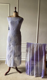 The set on the mannequin with its dupatta beside it