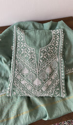 Green pure mul chanderi kurta piece folded, fine front and back jaaldar chikankari anarkali
