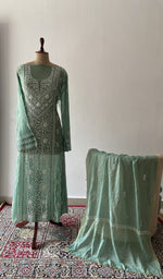 The set on the mannequin with its dupatta beside it