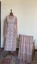 The set on the mannequin with its dupatta beside it