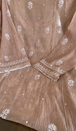 The dupatta spread out, dusty rose mul chanderi