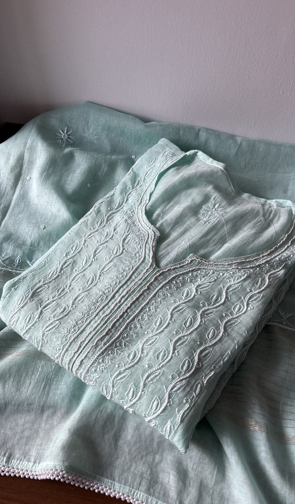 Turquoise pure mul chanderi kurta piece folded, fine front and back jaaldar chikankari anarkali
