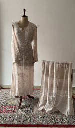 Pink pure mul chanderi chikankari suit set on the mannequin with its dupatta