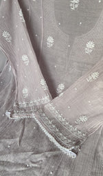Hem and border of the grey dupatta
