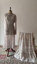 Grey pure mul chanderi chikankari suit set on the mannequin with its dupatta