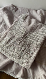 Folded kurta piece and dupatta, chikankari along the hem