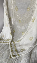 The kurta piece folded on the carpet