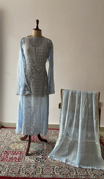 Blue pure mul chanderi chikankari suit set on the mannequin with its dupatta
