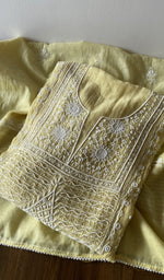 Folded kurta piece and dupatta, chikankari along the hem