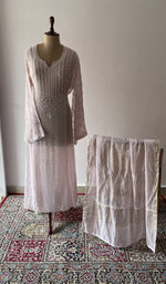 Peach pure mul chanderi chikankari suit set on the mannequin with its dupatta