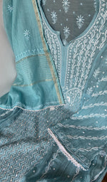 Hem and border of the turquoise dupatta
