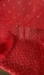 Hem and border of the red dupatta