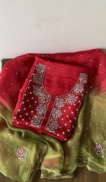 Folded red pure organza silk kurta piece with chikankari on the panel
