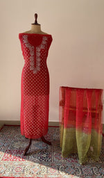 Red pure organza silk chikankari suit set on the mannequin with its dupatta