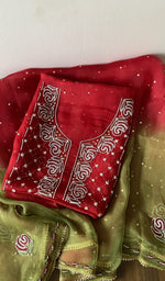 Folded kurta piece and dupatta, chikankari along the hem