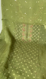 Hem and border of the green dupatta
