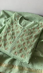 Folded kurta piece and dupatta, chikankari along the hem