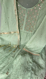 Sleeve work on green pure mul chanderi