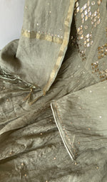 Hem and border of the green dupatta