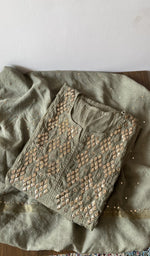 Thread detail on green pure mul chanderi