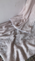 Folded kurta piece and dupatta, chikankari along the hem