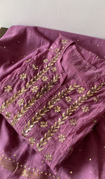 Folded kurta piece and dupatta, chikankari along the hem