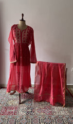 Red pure mul chanderi chikankari suit set on the mannequin with its dupatta