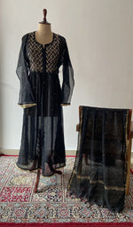 Black pure mul chanderi chikankari suit set on the mannequin with its dupatta