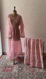 Pink pure mul chanderi chikankari suit set on the mannequin with its dupatta