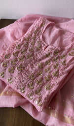 Folded kurta piece and dupatta, chikankari along the hem