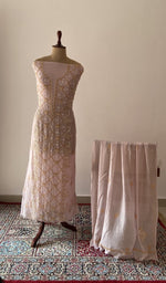 Pink pure mul chanderi chikankari suit set on the mannequin with its dupatta