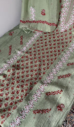 Hem and border of the green dupatta